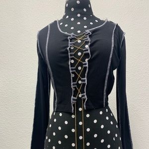 long sleeve black top with chain